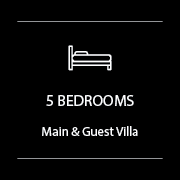 Sign indicating a property with 5 bedrooms, main and guest villa.
