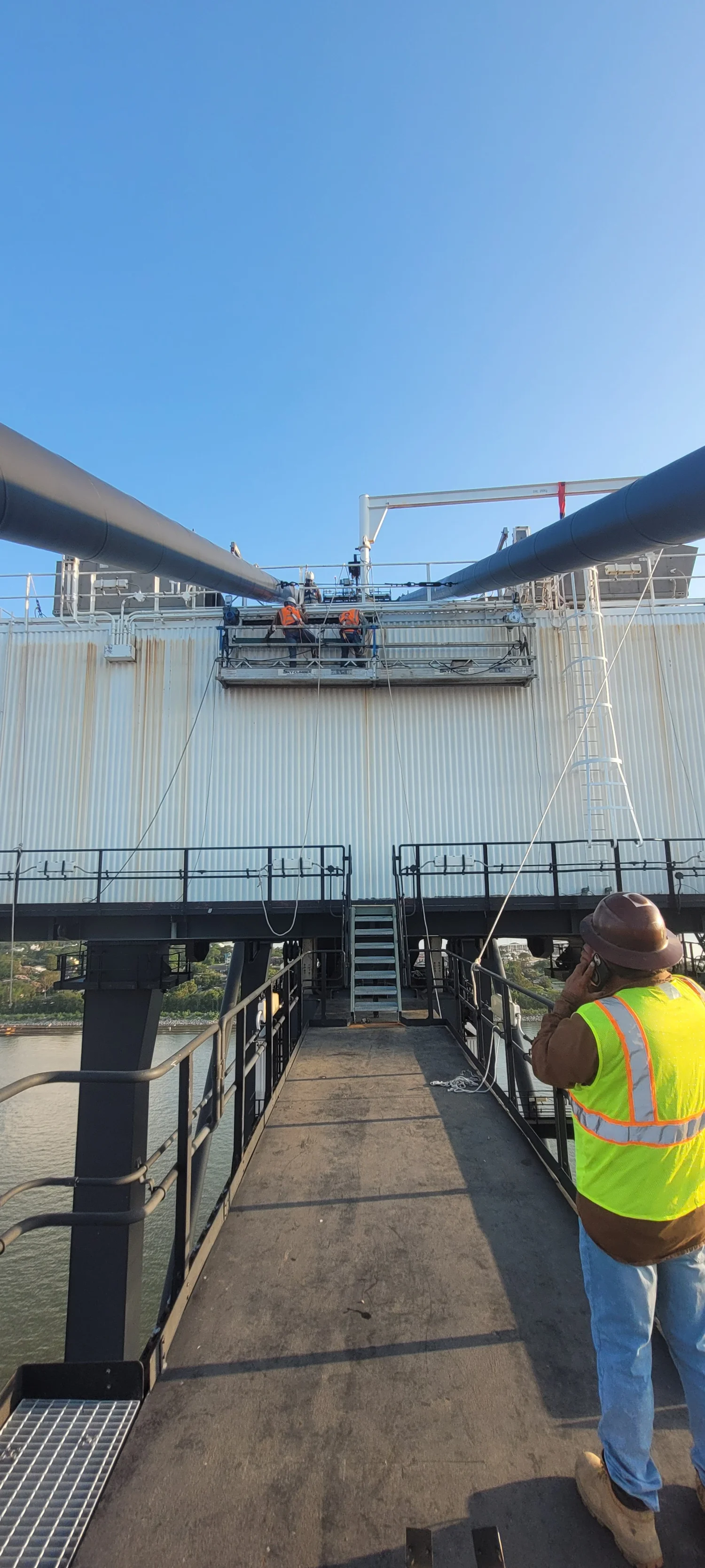 Allied Industrial Services crews performing industrial lead abatement on elevated piping