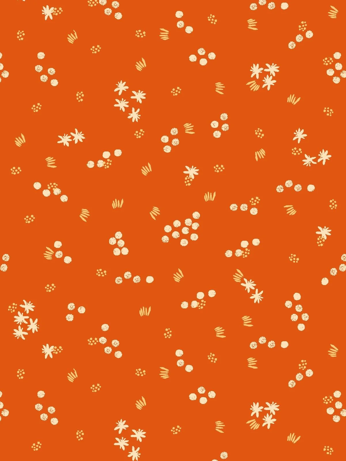 Small-scale ditsy pattern of cream dots and grass-like marks, on a burnt orange background - Spring Block Garden collection coordinate.