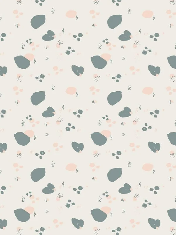 Small-scale abstract coordinate for the Bitter Remedy collection - sage green and peach dots and leaf fragments scattered on a cream background.