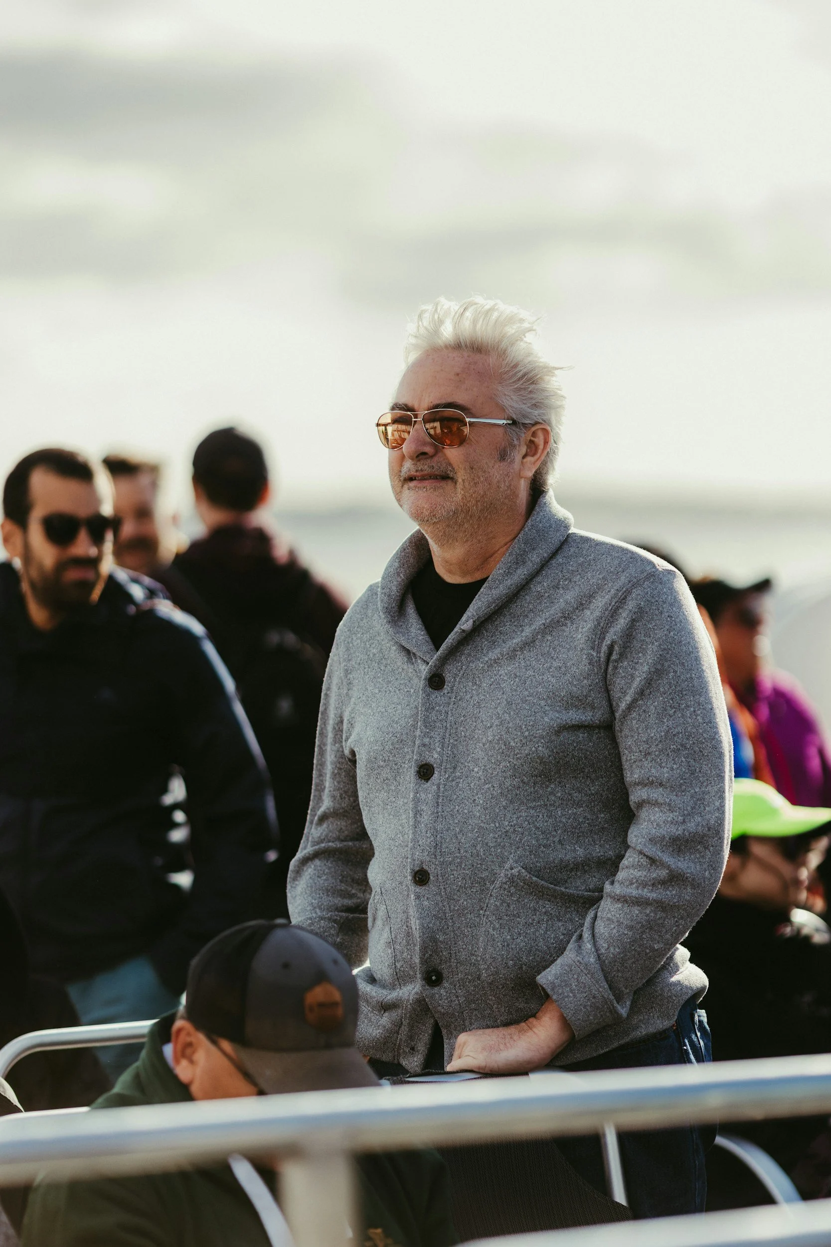 older man standing outdoors