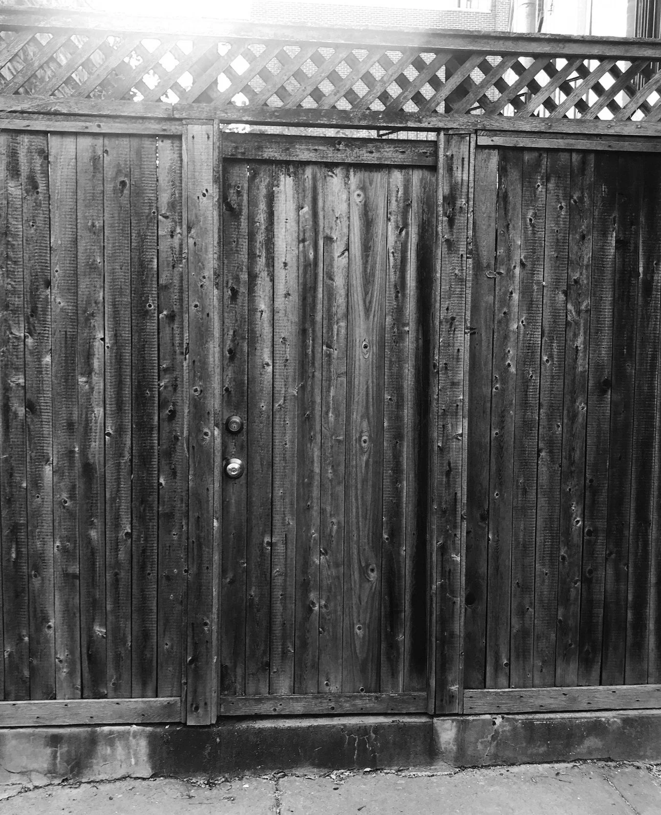 Wooden door with the sun shining