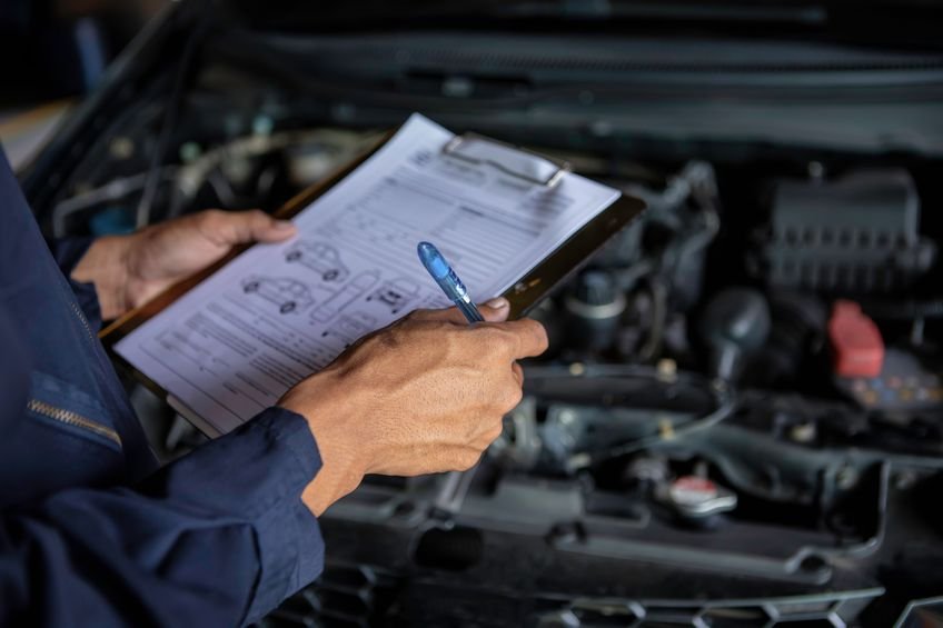 MOT_tester_with_list_of_what_is_checked_during_an_MOT.jpg