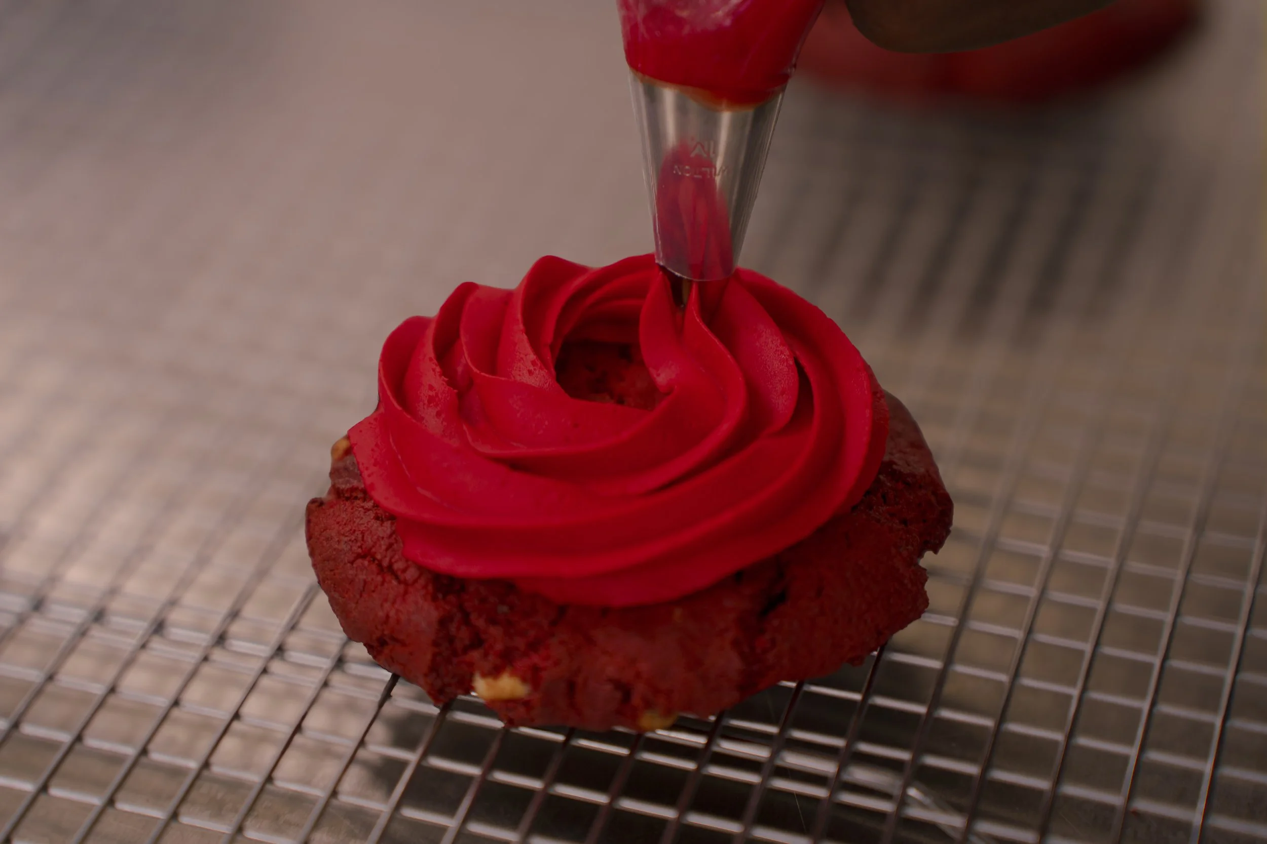 Red Velvet Gourmet Cookie with red frosting