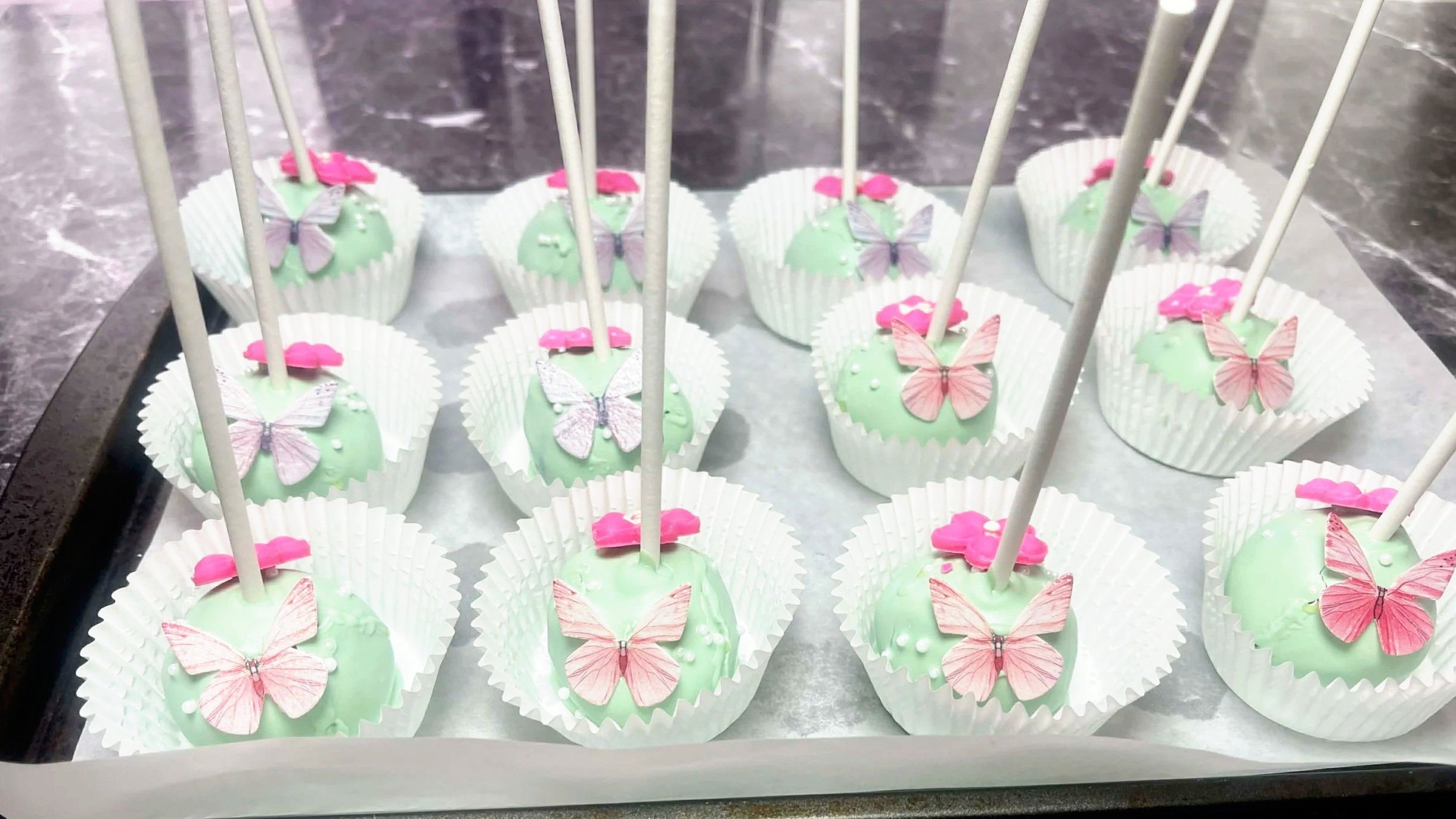 Turquise Pink an White Cake Pops with butterflies From Sweet TemptationZ