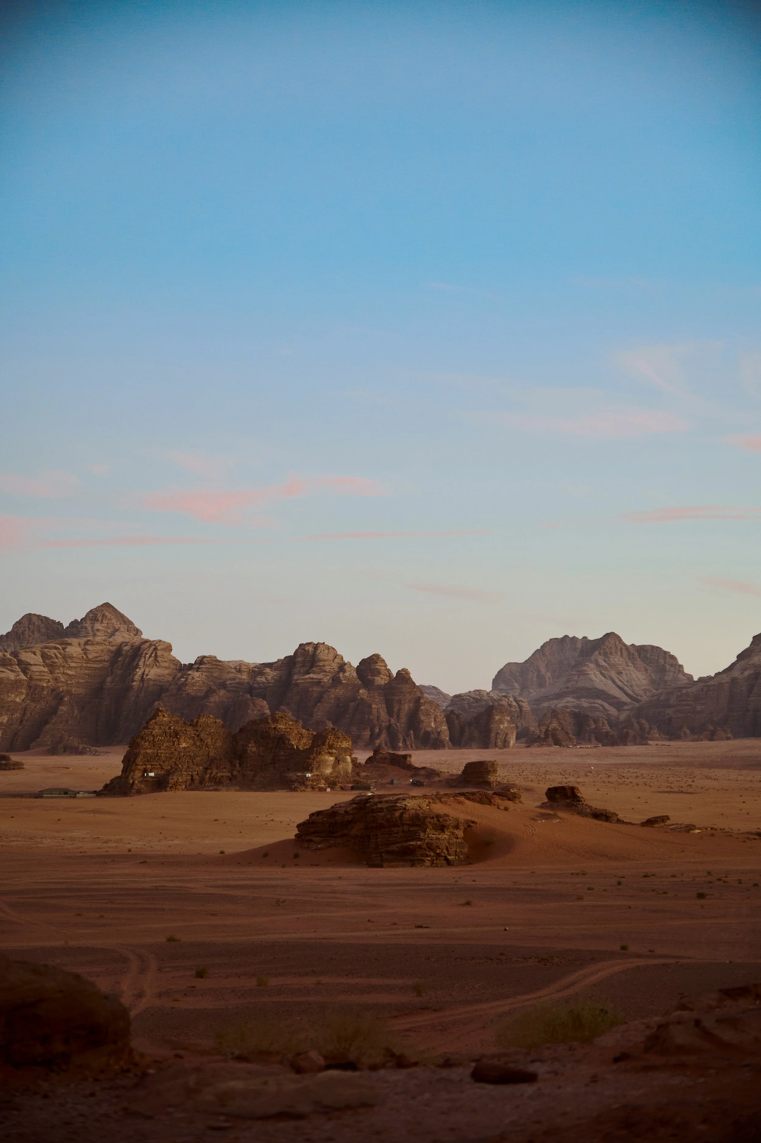 A landscape image of hills in a desert