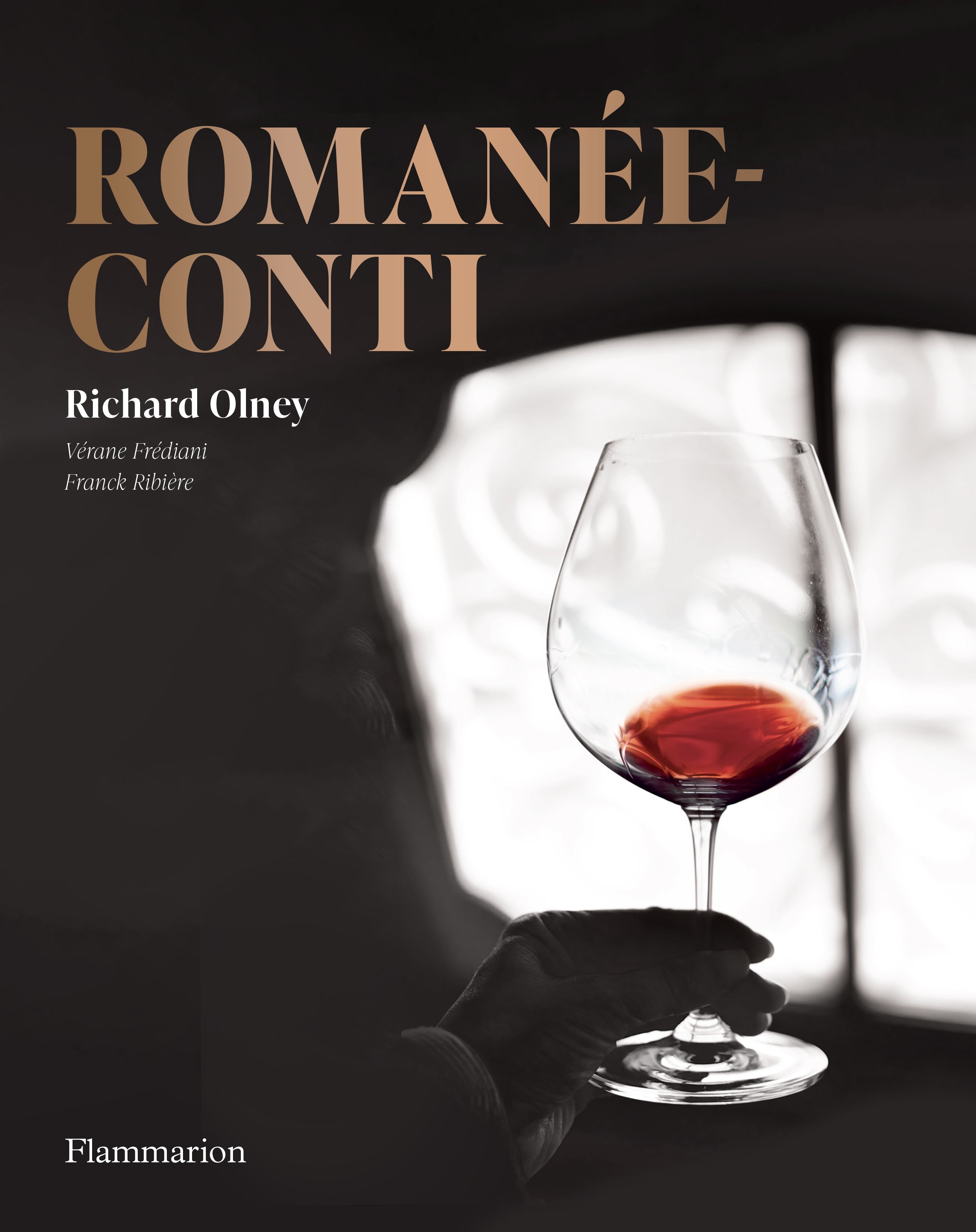 Book cover titled "Romanée-Conti" with a silhouette of a person holding a glass of red wine against a window background. Book written by Richard Olney. Vérane Frediani and Franck Ribière worked on the new edition.