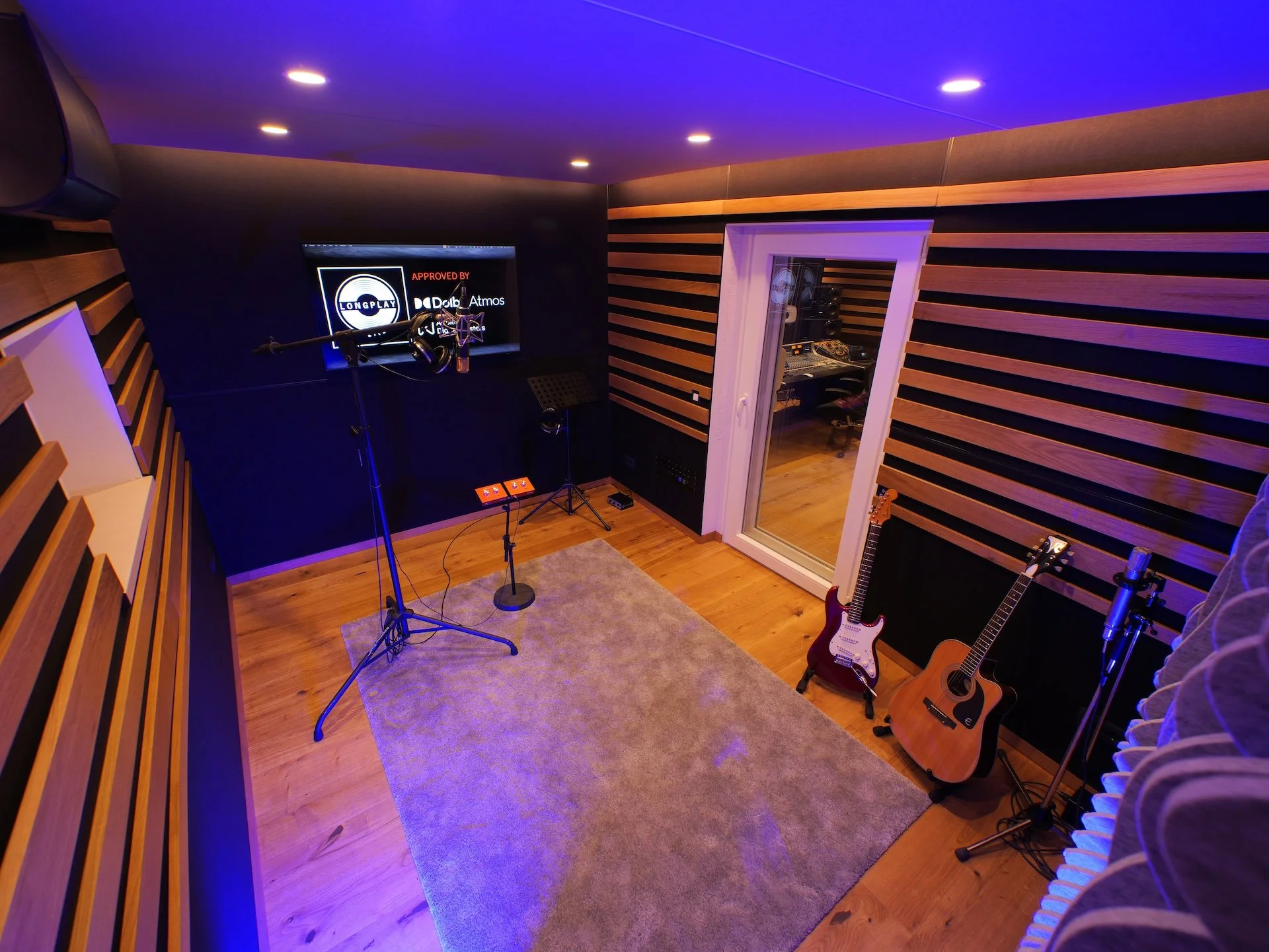 Longplay Studios recording room with direct visual connection to the Dolby Atmos control room