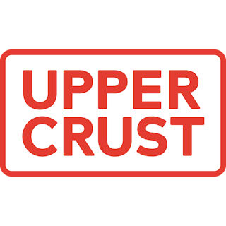 Red and white logo that reads 'UPPER CRUST'.