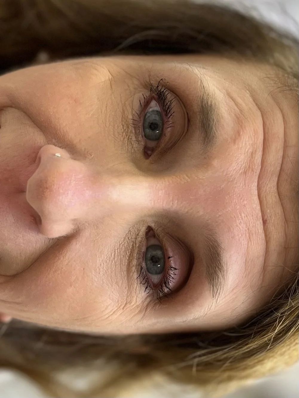 Beautiful client closeup before photo showing natural brow with noticeable sparseness and thinning #before #nanobrow #treatment #permanent #makeup #salon21 #radstock