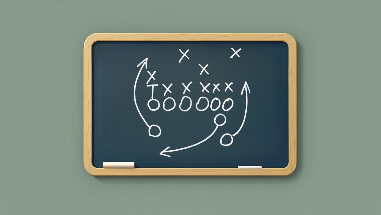 Football strategy diagram on a blackboard showing offensive and defensive plays.