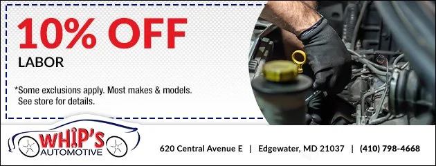 A coupon offering 10% off labor from Whip's Automotive, with contact information and a photo of a mechanic working on a car engine.