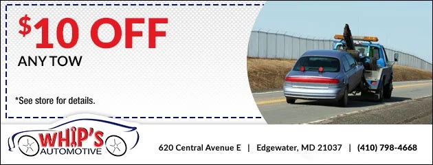 A coupon offering $10 off any tow at Whip's Automotive, located at 620 Central Avenue E, Edgewater, Maryland. The coupon includes an image of a tow truck towing a gray car on a highway.