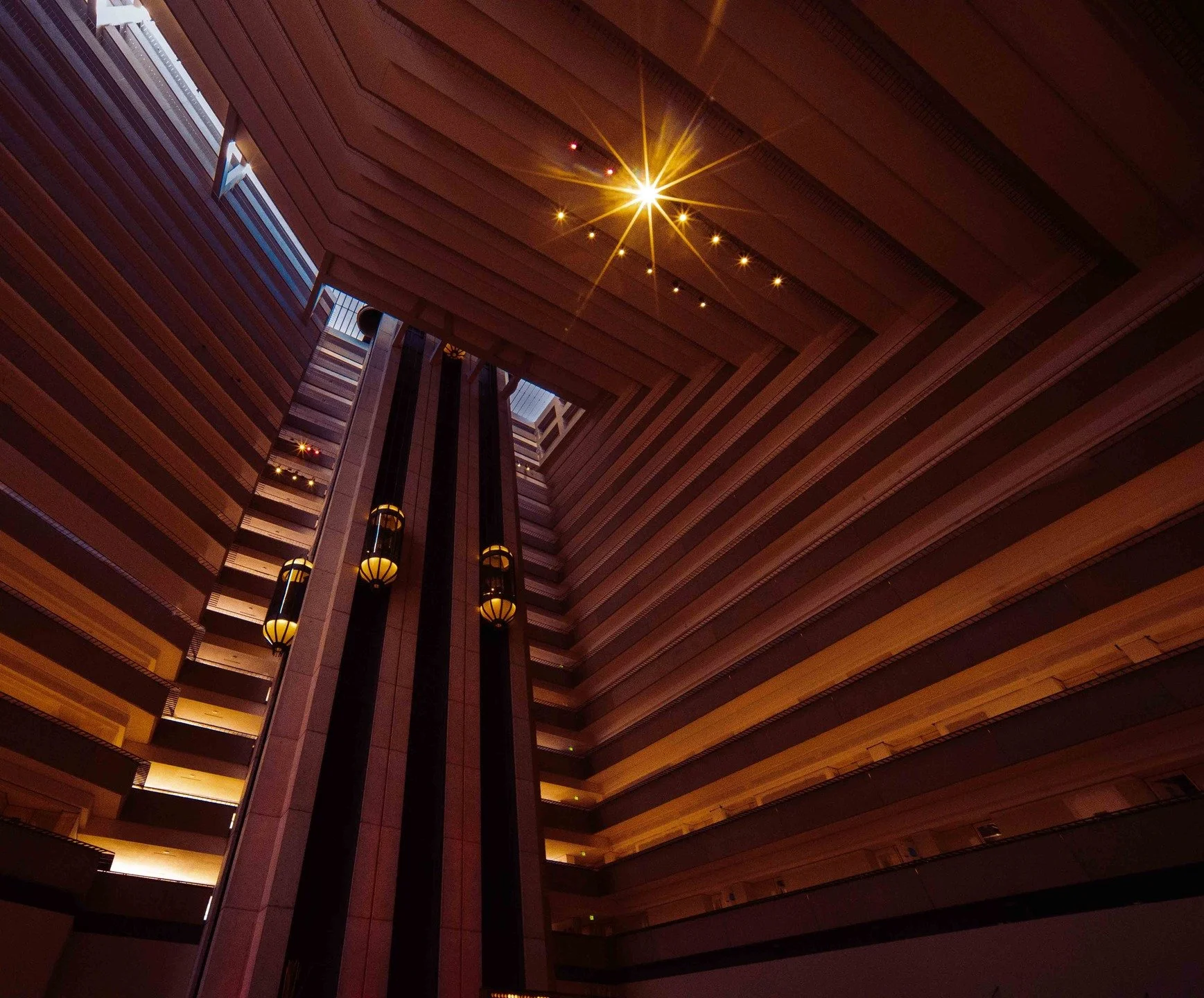 Been learning color grading in Darktable, trying to pull my workflow over (it's fun i swear)
Today on Buildings That Go Hard is the Hyatt Regency in San Francisco
Full res and daytime funny shot available on the website