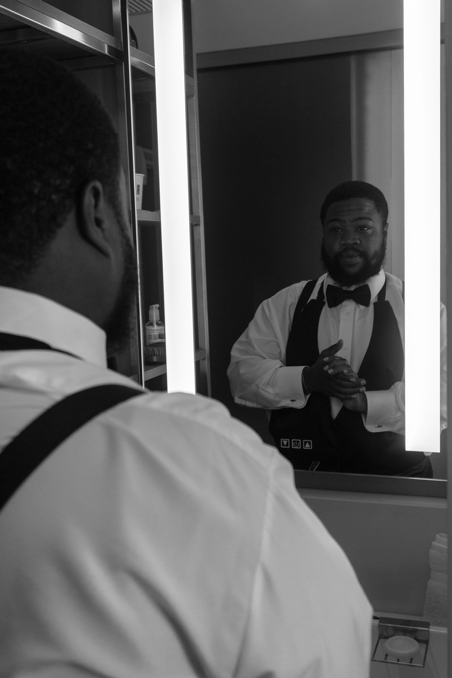 documentary-wedding-photography-groom-preparation-mirror.jpg