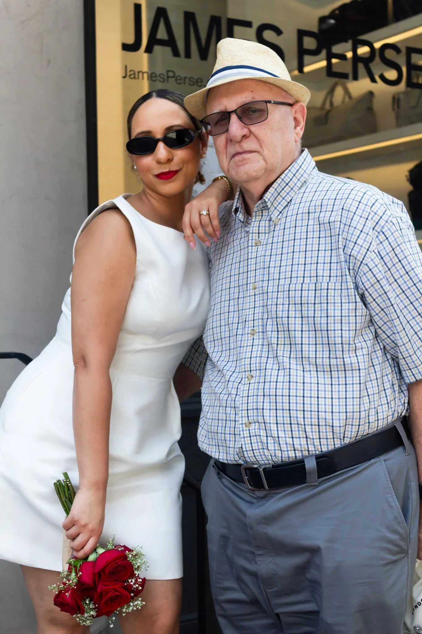 bride-hugs-father-city-hall-elopement-family.jpg