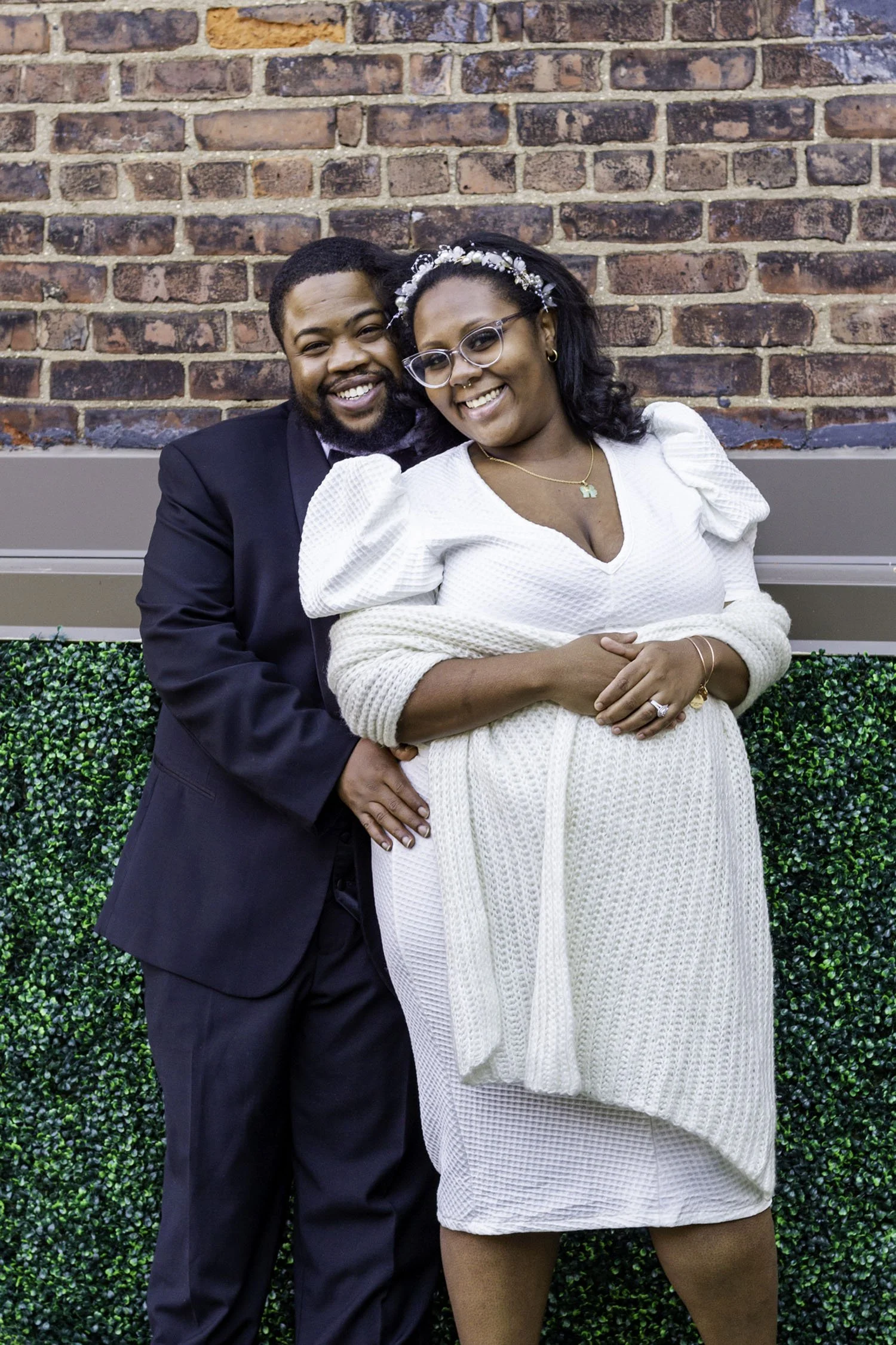 couples-portrait-brick-wall-natural-light-wedding.jpg