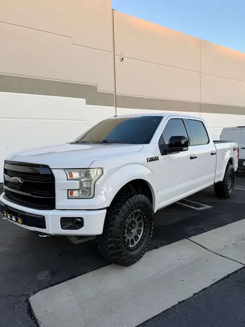 White heavy duty Ford pickup truck
