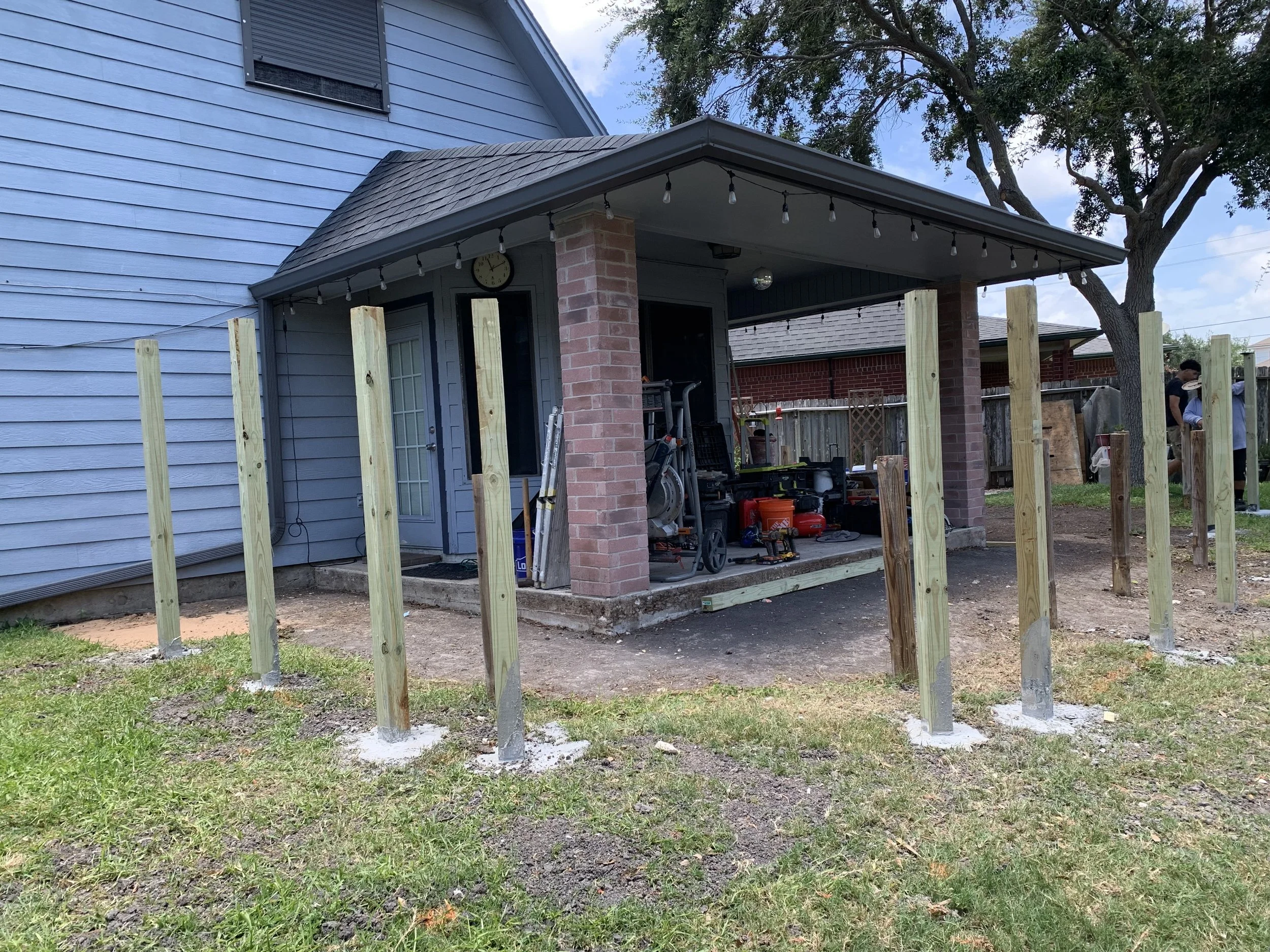 Foundation phase: posts set and squared for a new elevated deck