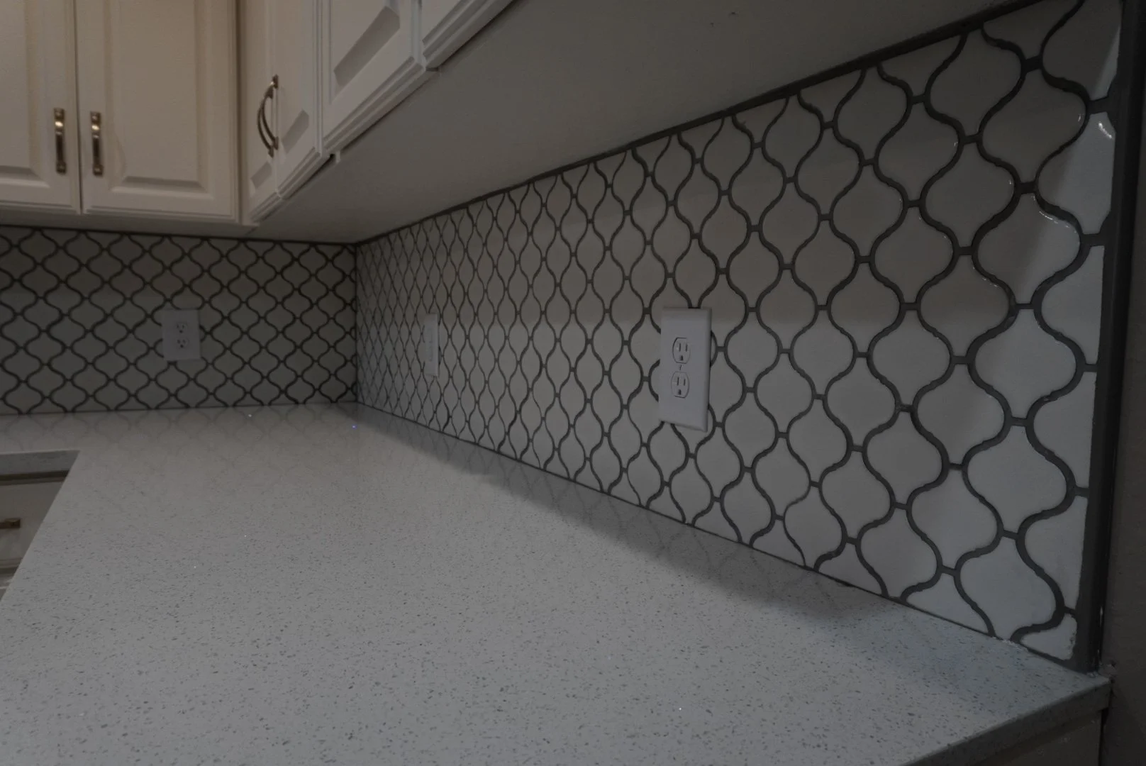Statement Backsplash & Crisp White Cabinetry