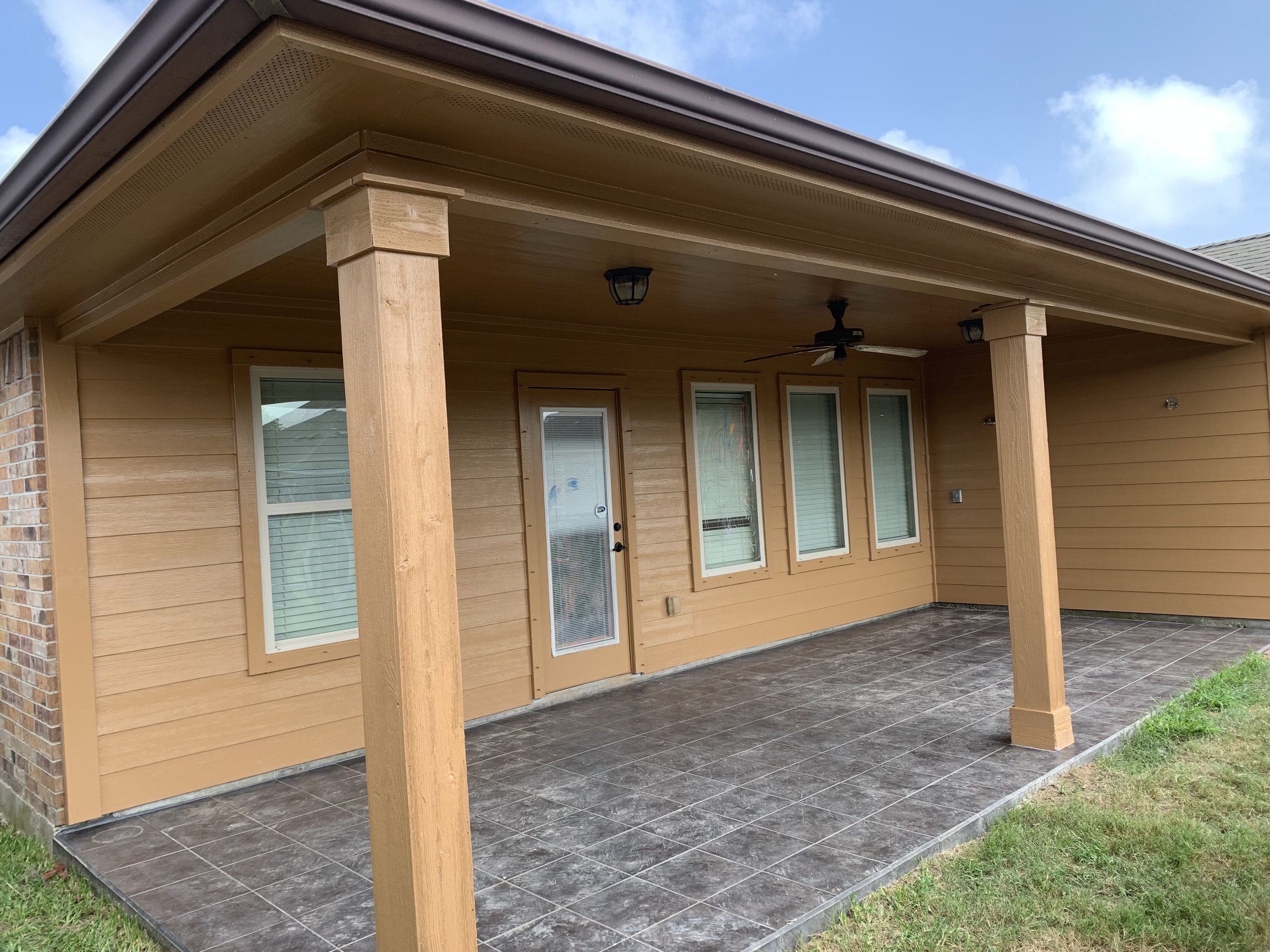 Fresh paint touch-ups on back patio and pillars.