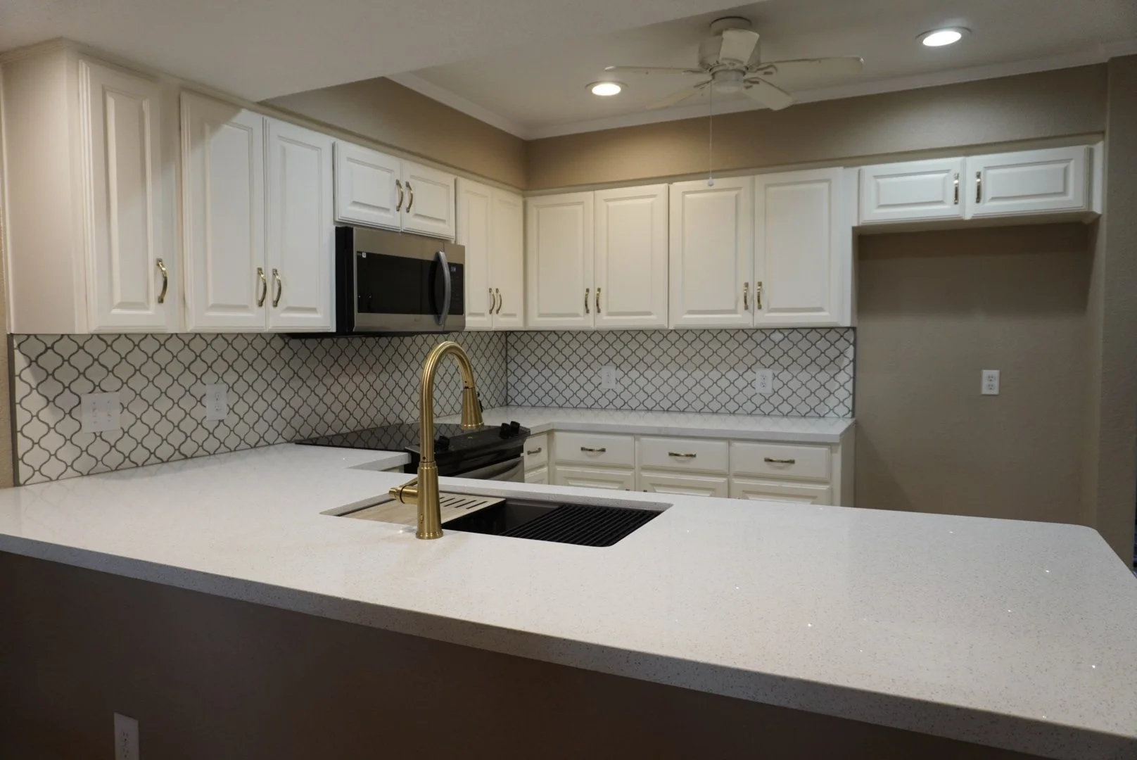 Clean Countertops, Updated Finishes, Open Concept