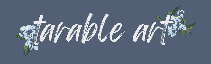 Text reading 'tarrable art' with blue and white flowers on a dark blue background.