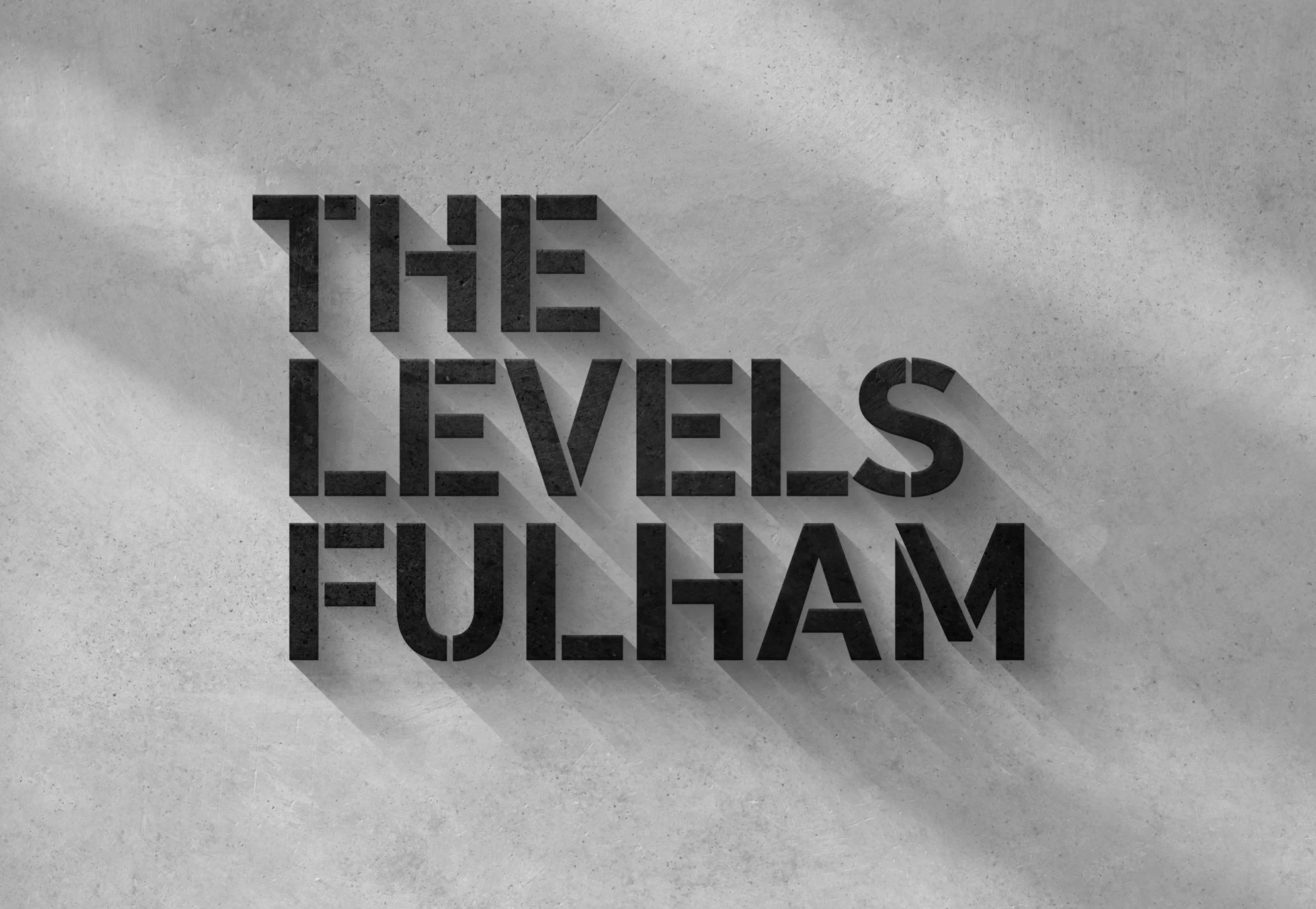 The text 'The Levels Fulham' in bold black 3D letters casting shadows on a gray textured background.