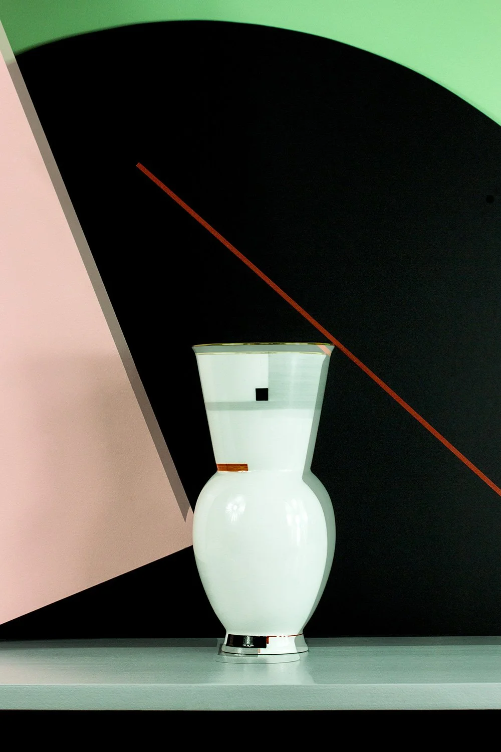 geometric still life with vase from the kpm bauhaus edition with motion blur, art direction and styling by Steffi Bühlmaier, photography by loreen hinz