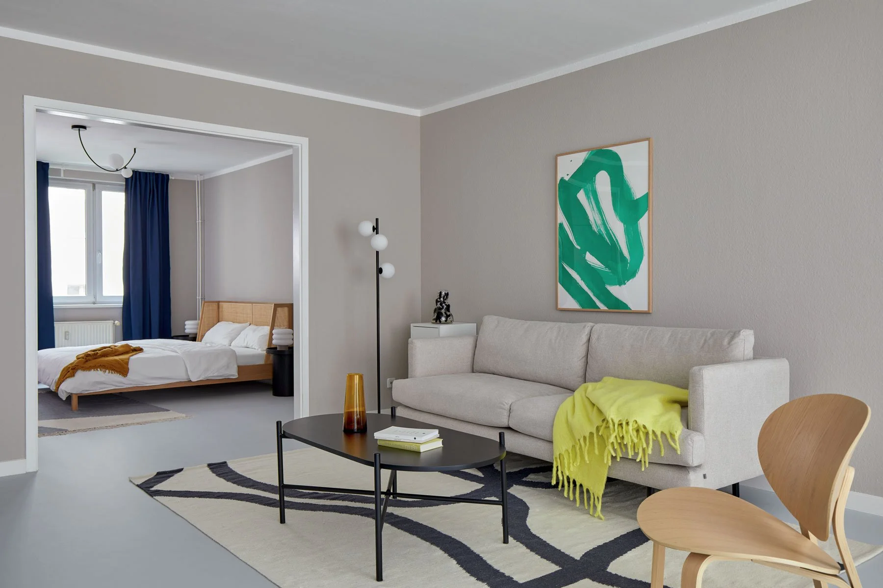 Bedroom interior with wooden bed, plant and soft natural light, apartment in Berlin Mitte, interior design, Innenausbau and styling by Steffi Bühlmaier, photography by Tobias Bärmann, 2024