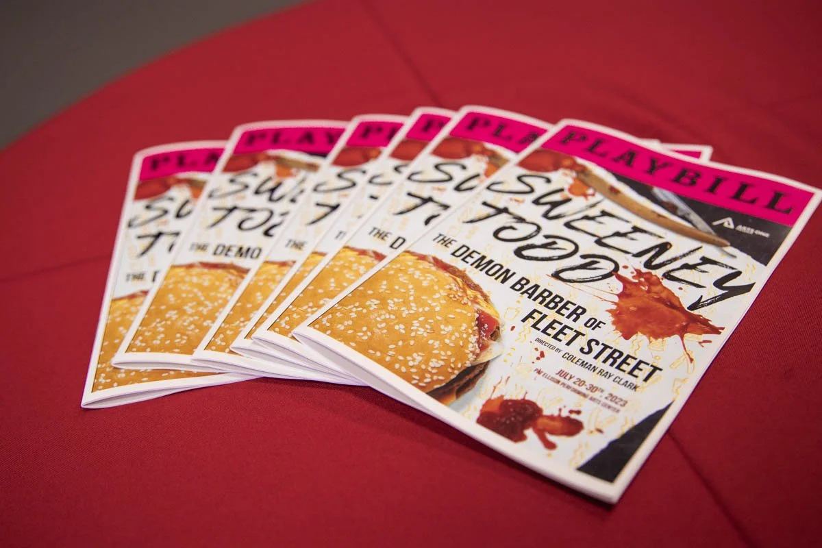 Multiple flyers for a show called 'Sweetney Toot' at the Demon Barber of Fleet Street, with a burger image, blood splatters, and event date details.