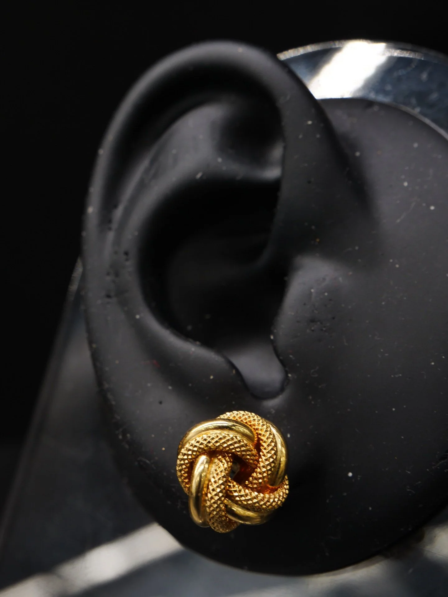 Boucle d'oreille grand noeud rosette