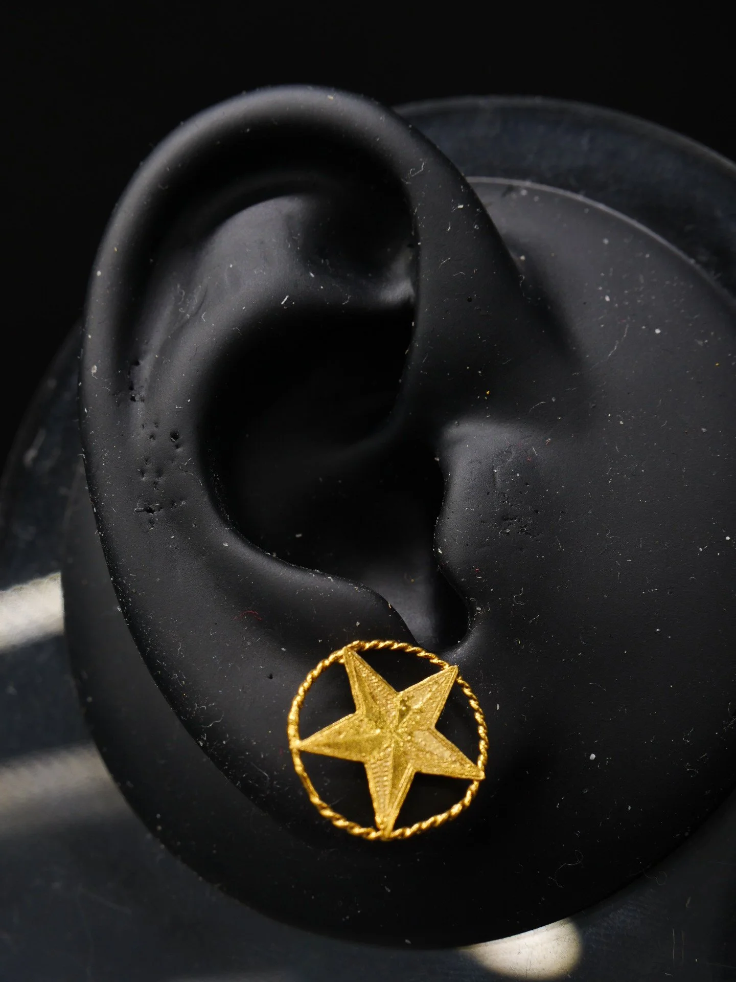 Boucle d'oreille petite étoile