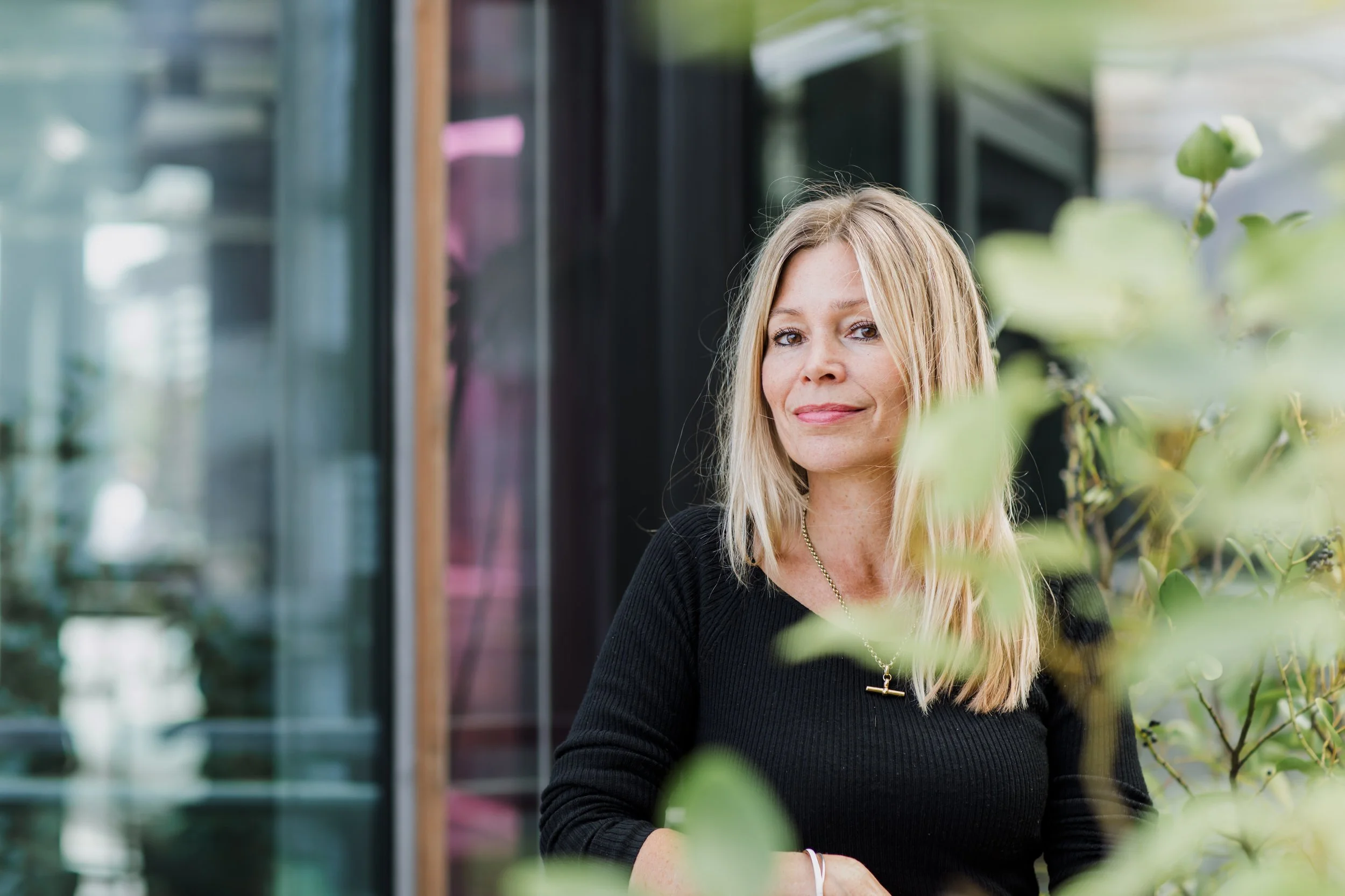 Nutritionist behind a plant