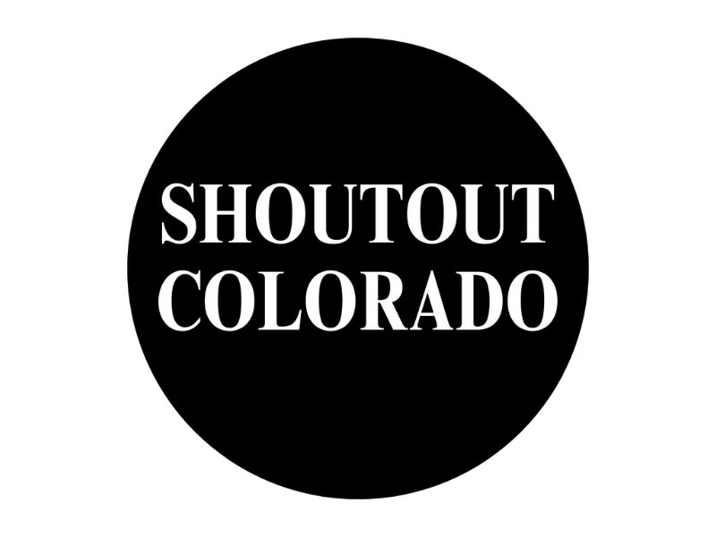 A black circle with white text that reads "SHOUTOUT COLORADO."