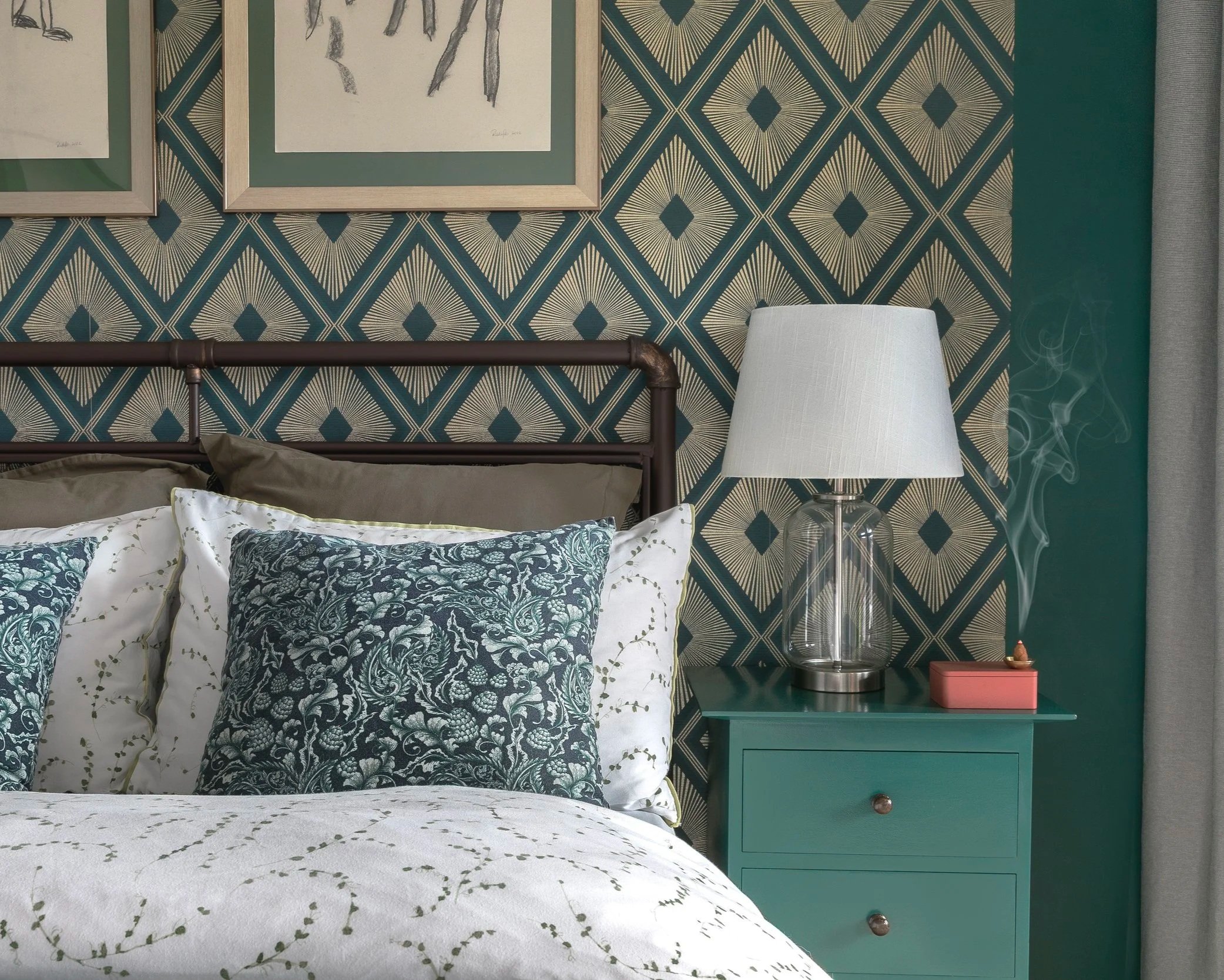 Guest bedroom detail with Art Deco geometric wallpaper and teal bedside table, Bow East London apartment by Rodolfo Falcao