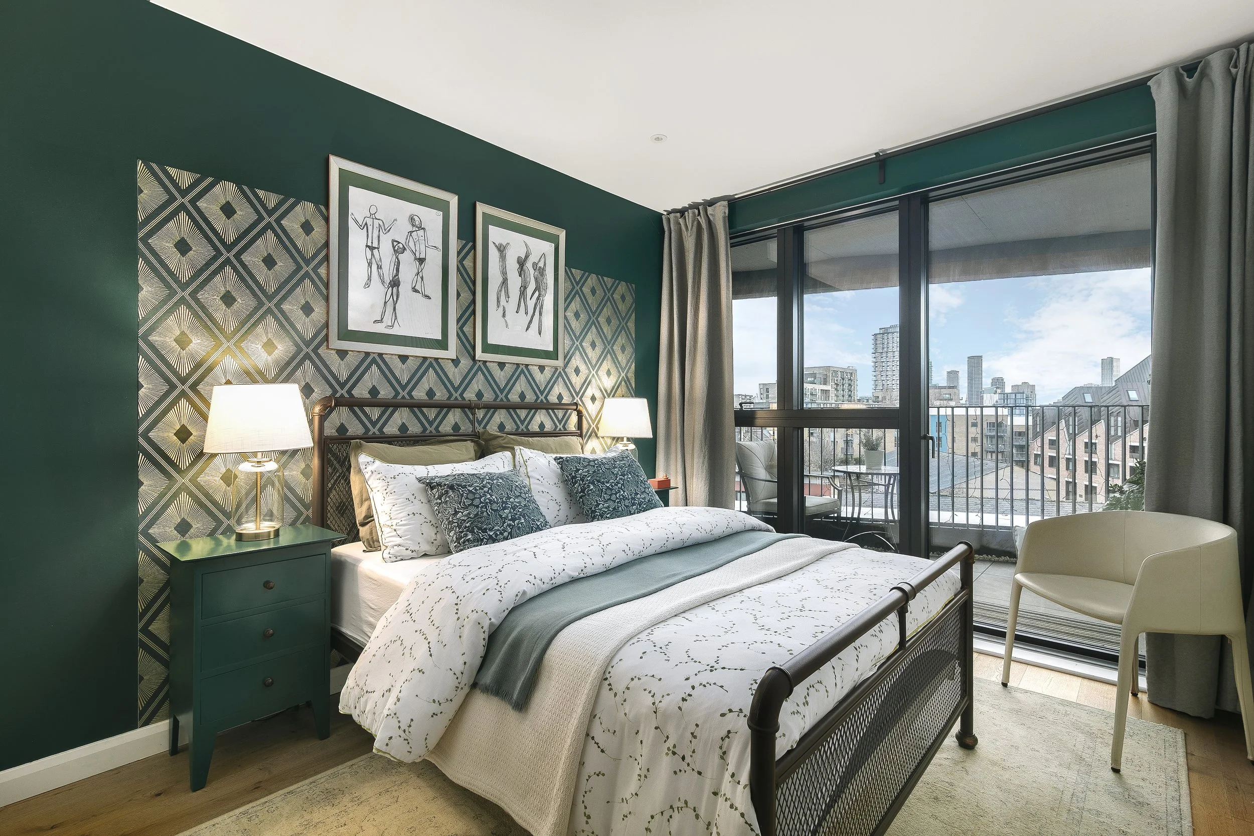 Guest bedroom with forest green walls, Art Deco wallpaper and city views, Bow East London interior design by Rodolfo Falcao