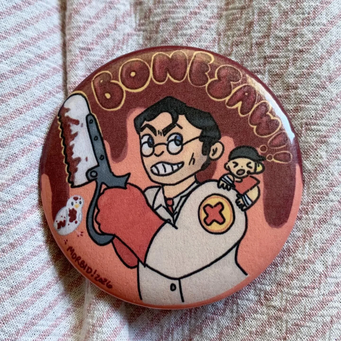 custom tf2 pins commissioned at my last market!! i had sooo much fun drawing these characters again after 15 years ;v; this really awakened the teenage gamer that still lives in my heart HAHA,, buttons always photograph badly due to glare and end up 