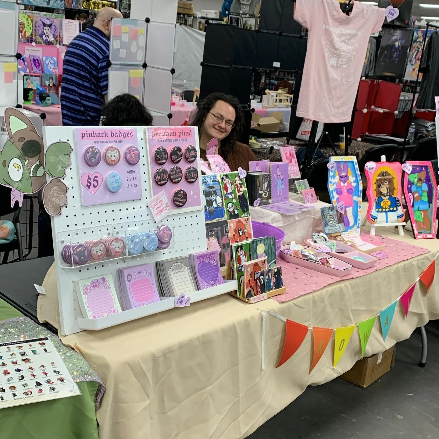 we're ready for @charliescollectibleshow Artist Alley this weekend!!! my set is kinda lacking but bc i'm doing a sale to clear old stuff so i can make more 🥹 come check us out today and tomorrow! 💕💕💕