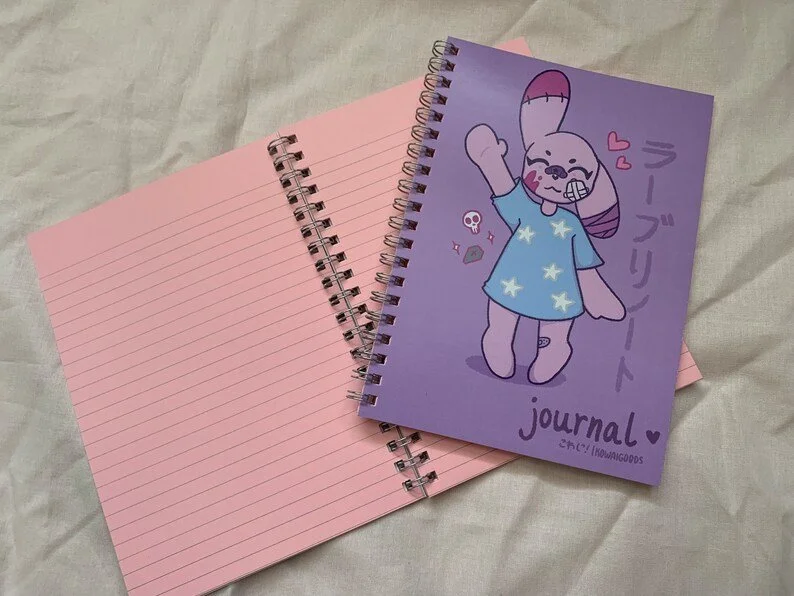 lovely note - our first spiral-bound notebook, with pink pages!