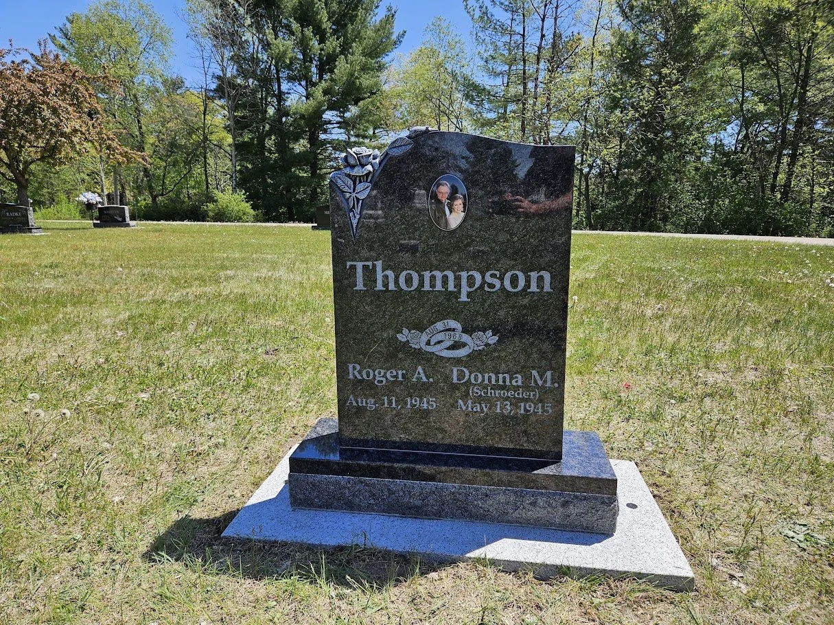 Silver Pearl Unique Special Shaped Gravestone with a Carved Antiqued Rose and a Porcelain Photo with a Floral Ring Wedding Design
