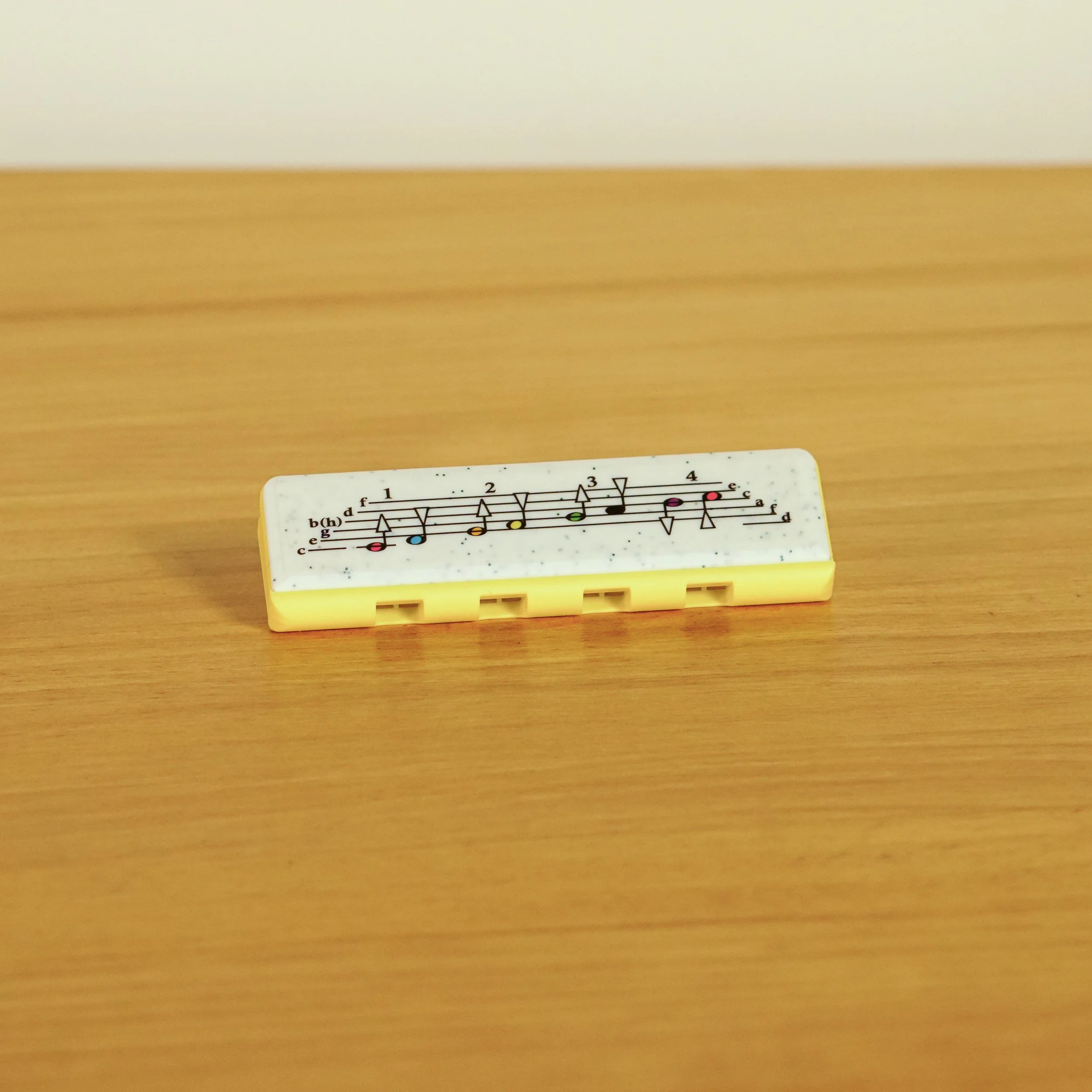 Armonica de iniciacion en Do color amarillo.