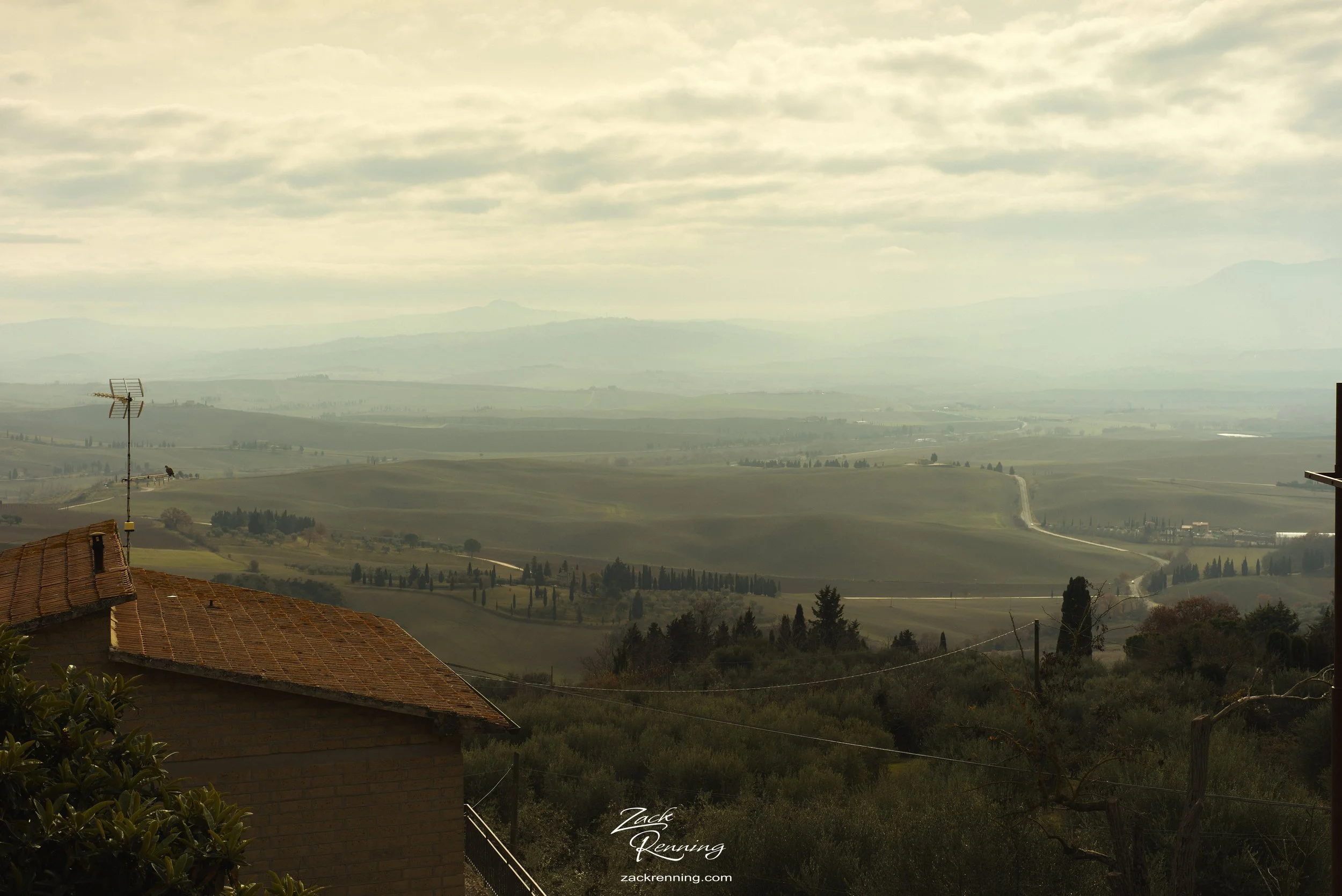 We took a tour through the Tuscan Hillside by car on our way from Florence to Rome. The pictures that are similar to this one are all from the same place; Pienza. Looking over the city walls to the horizon. 