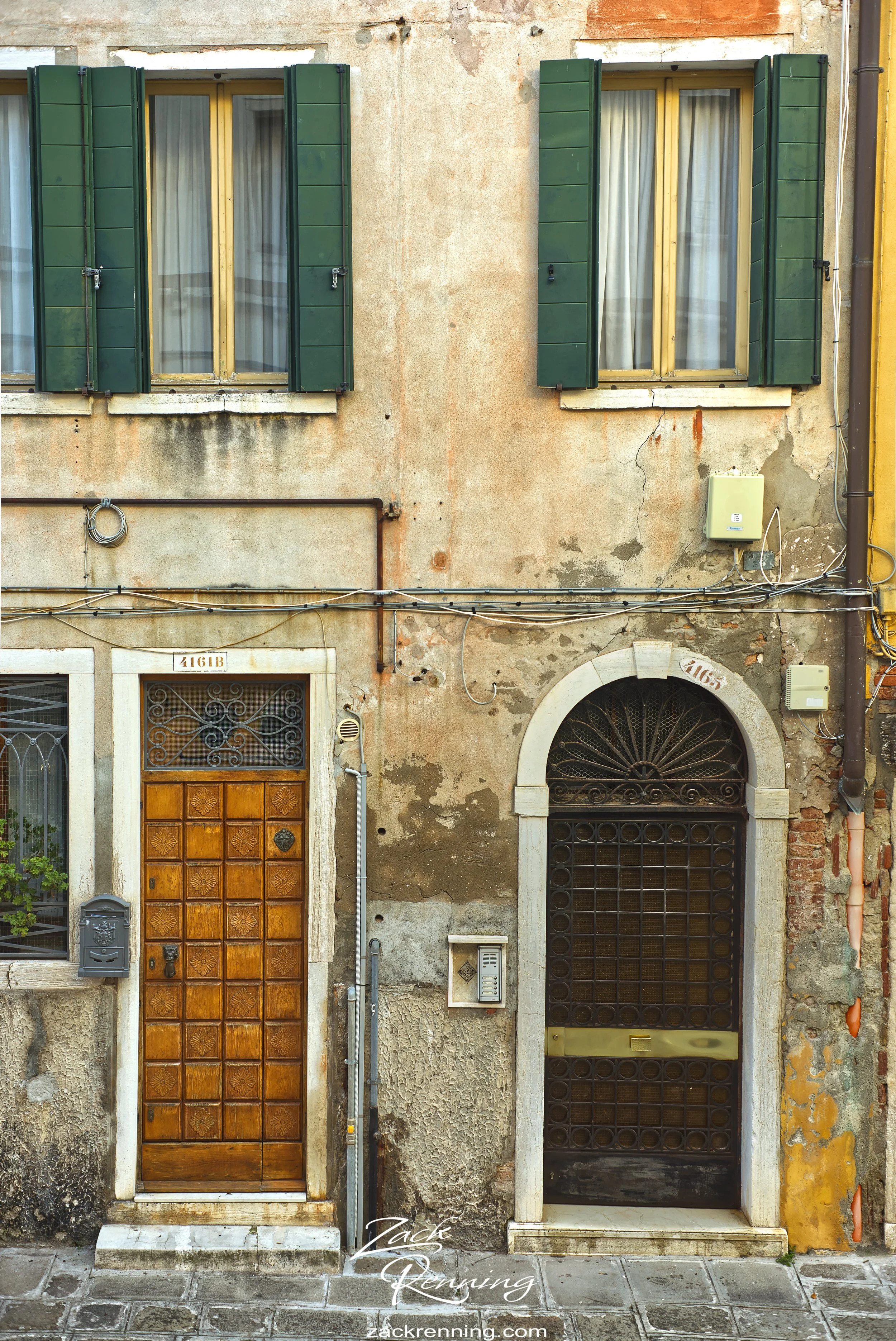 These are some doors that were right outside our hotel window. I waited about 10 minutes to get this picture because as soon as I saw the composition, a lady opened the door on the right as she was cleaning the house. 