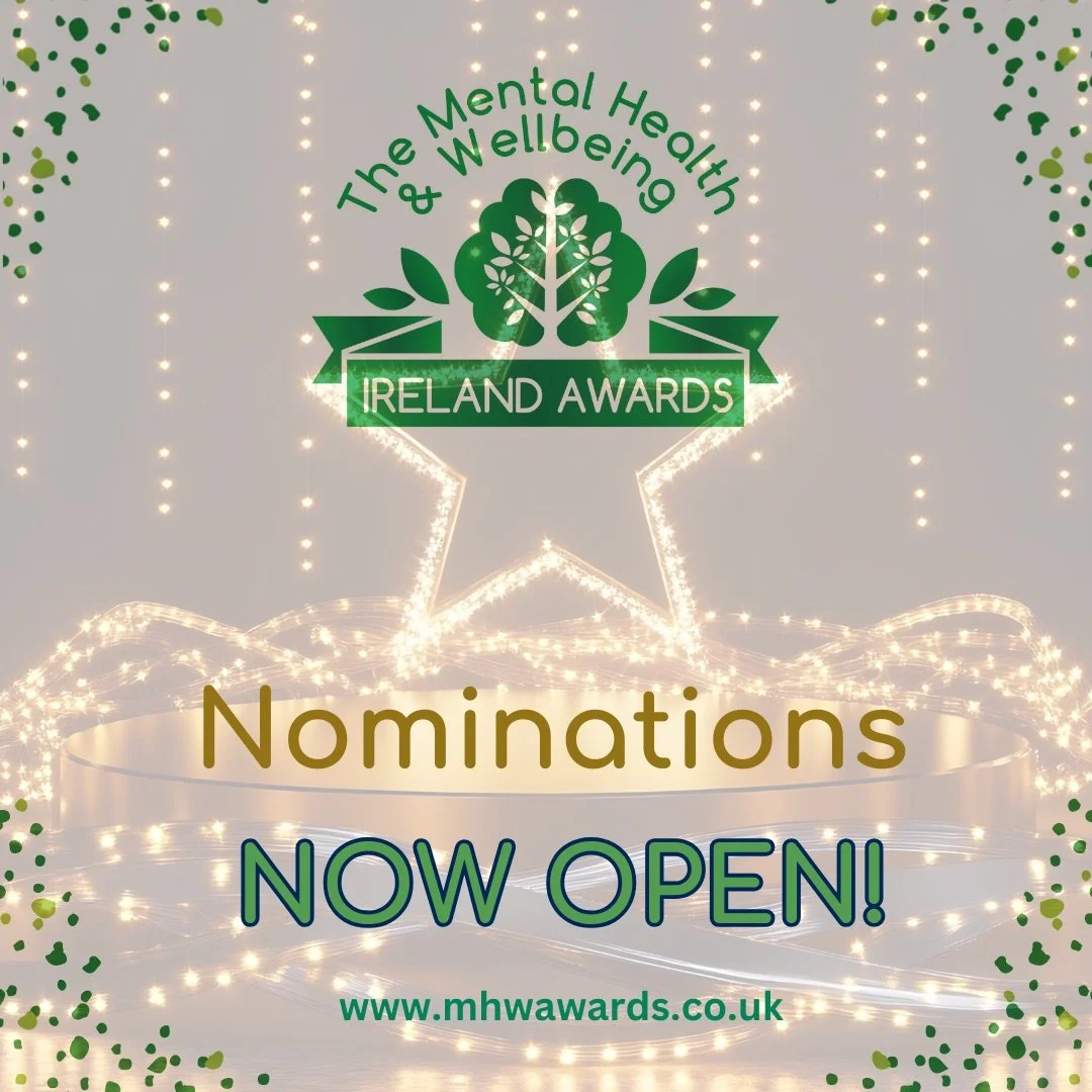 An announcement for the Ireland Awards, part of The Mental Health & Wellbeing Ireland Awards ceremony. The background features festive lights and a star with the website www.mhwawards.co.uk.