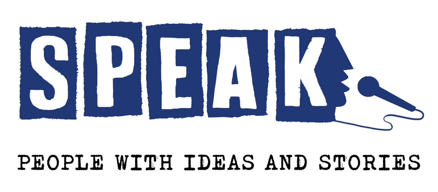The word 'SPEAK' written with blue, torn paper letters, with a microphone connected to a wire on the right side.
