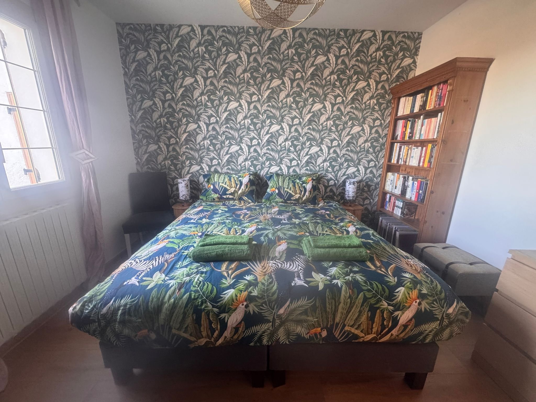 Front bedroom with views over the terrace and pool