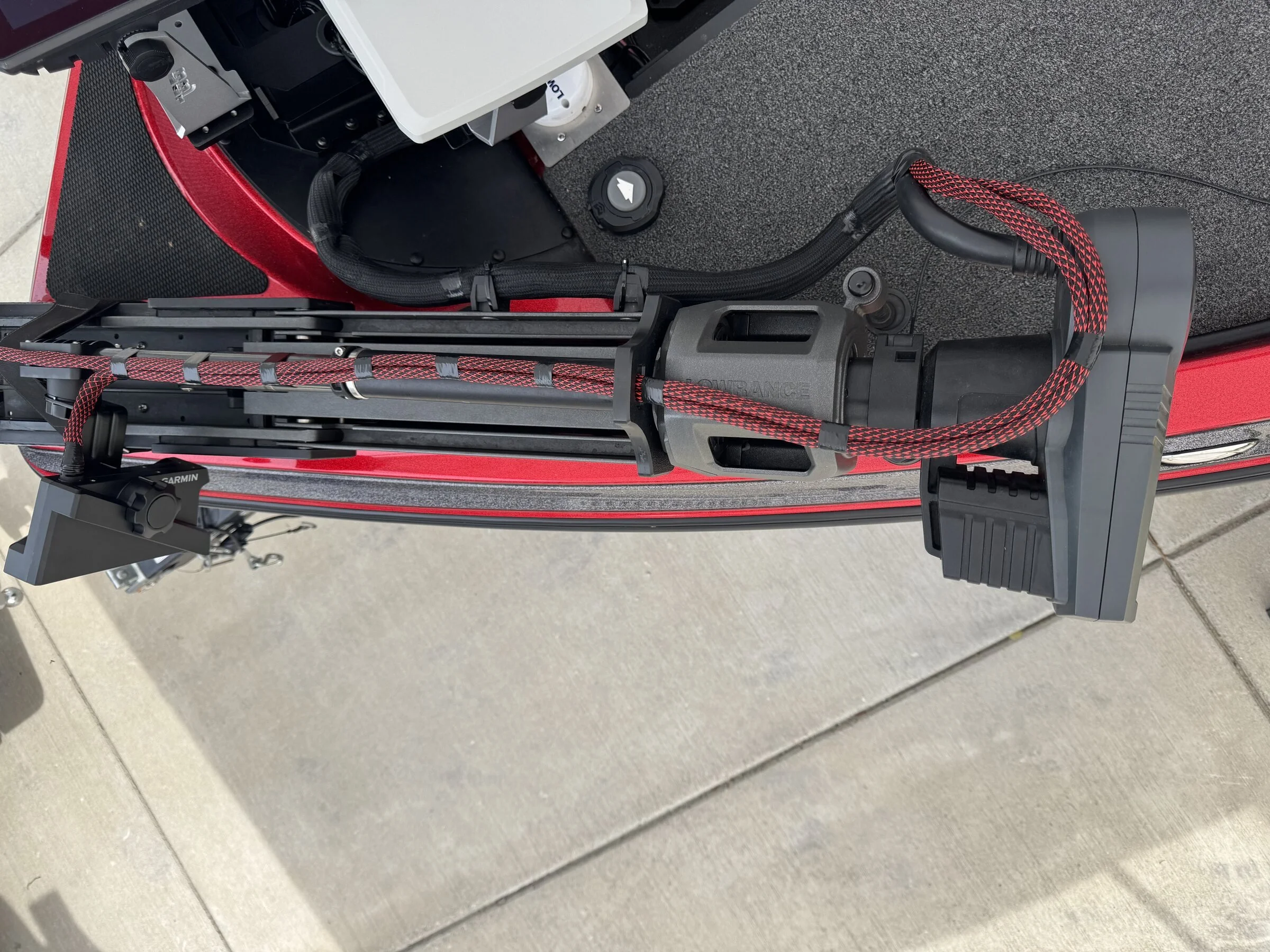 Garmin LiveScope mount and a Lowrance Ghost trolling motor rigged on a Caymas CX20 transom