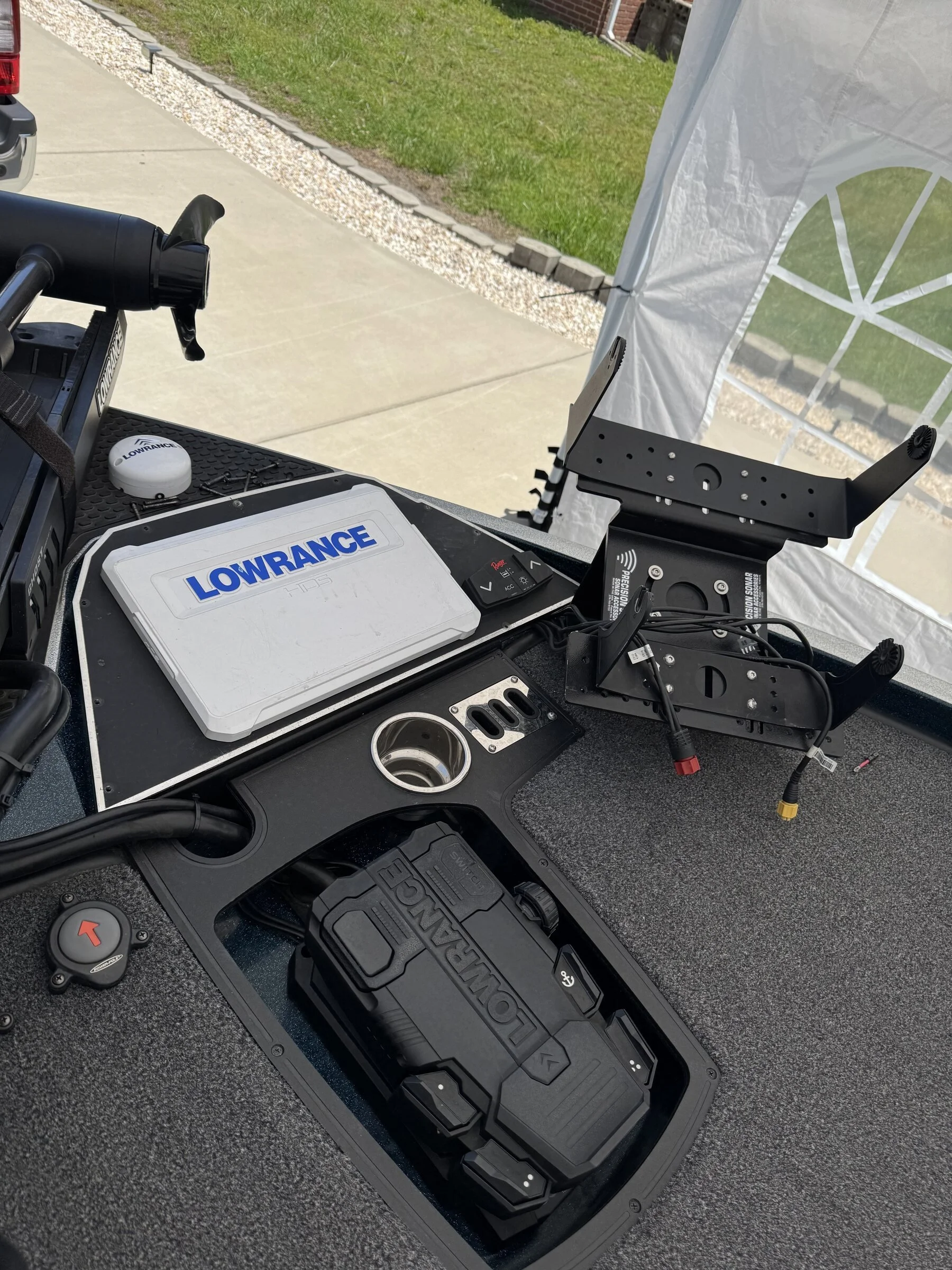 Lowrance chartplotters and GPS puck mounted at the console during a Ranger 520R rewire