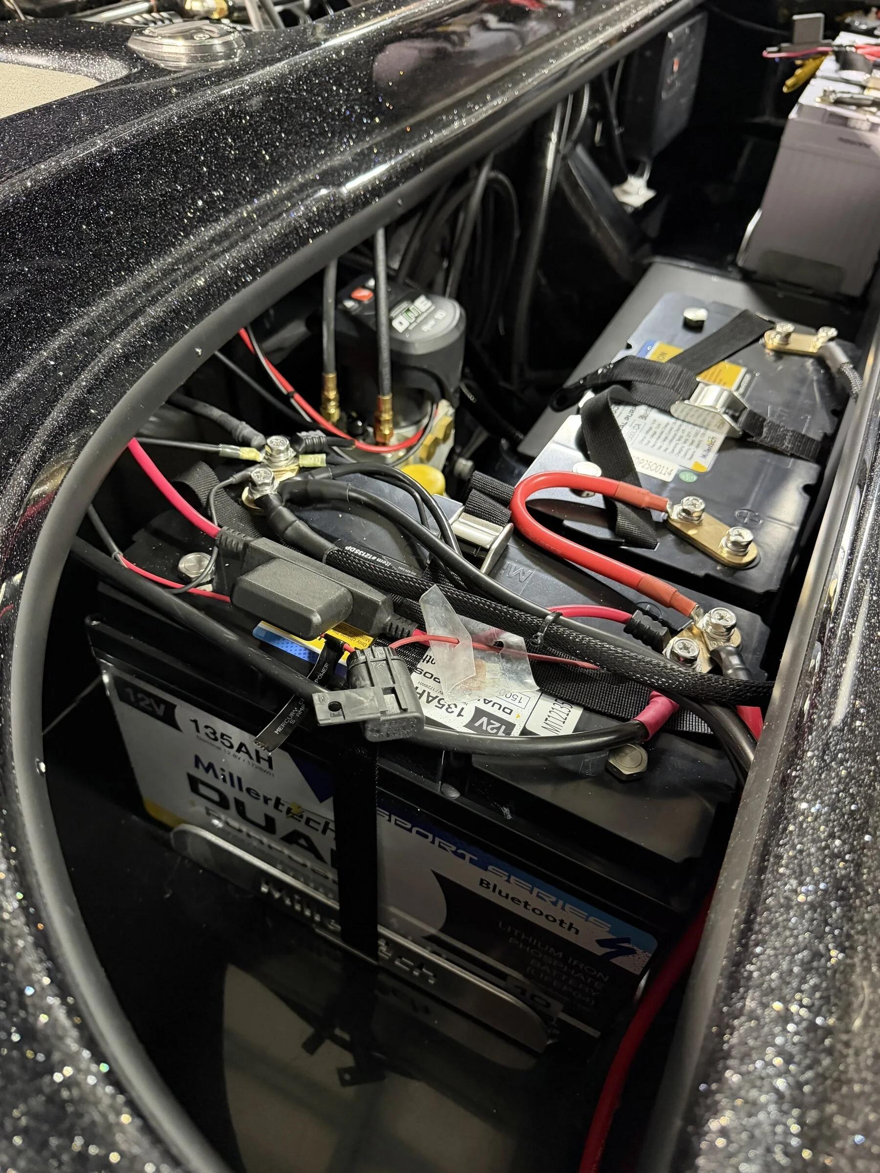 A second lithium battery bank strapped in and wired for a Falcon rigging project